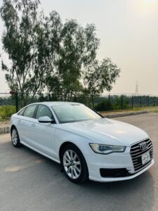 Audi A5 white luxury coupe available for rent at Fast Motors Rent a Car – sleek and stylish vehicle ideal for executive travel, events, and long-distance comfort rides.