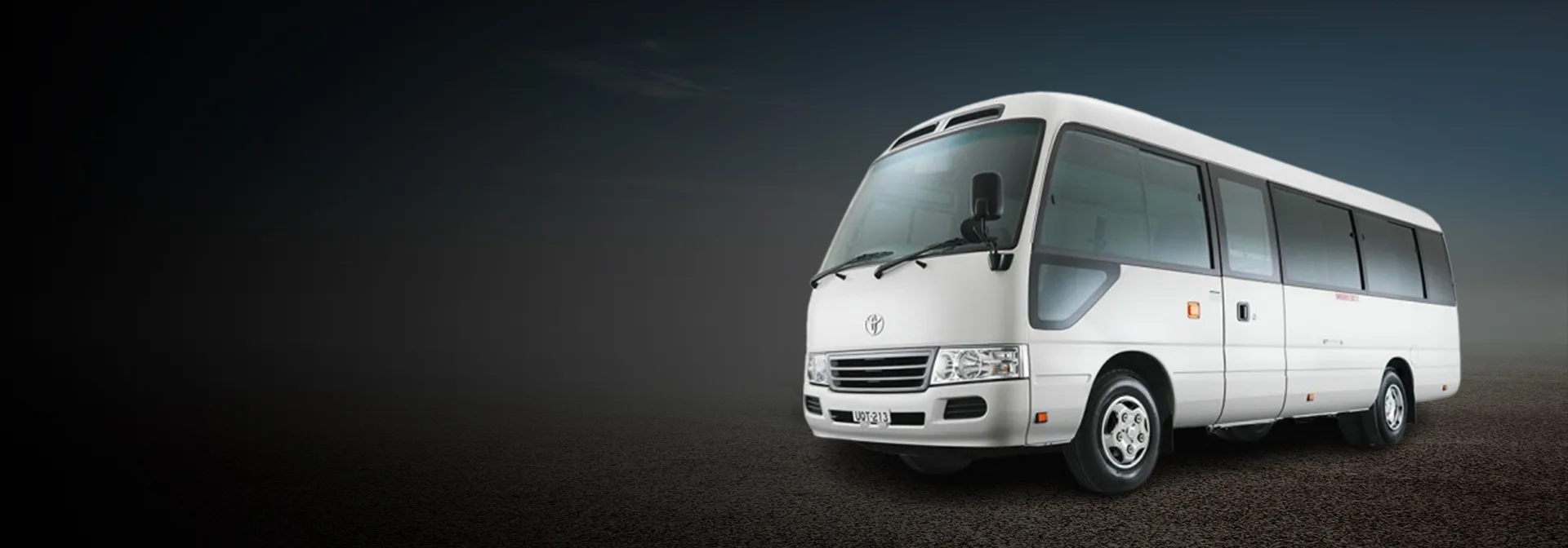 Toyota Coaster van for rent – spacious minibus ideal for group travel in Islamabad.